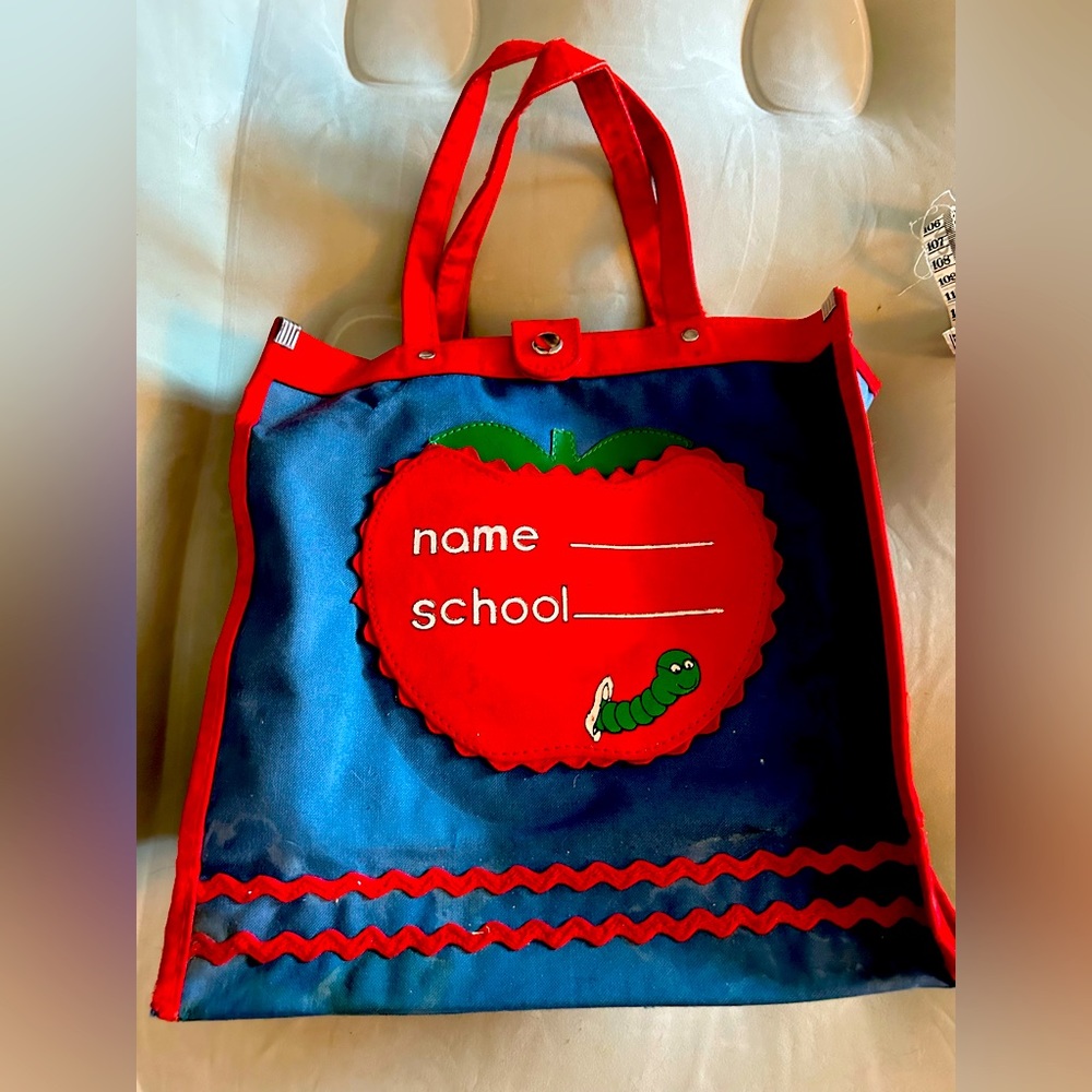 Vintage school bag with apple shaped snap coin purse